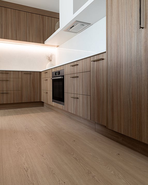 Laminate wood look floor in a bathroom.