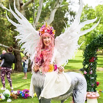 Woman dressed as Unicorn for party
