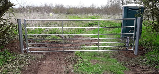 Metal and timber field gates installed.