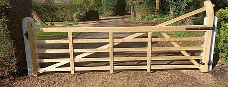 The rear view of a curved heel field gate with the gate furniture visible.