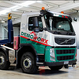 Demoworx vehicle signage designed in line with their brand created by Kaz - Design. Brand. Web.