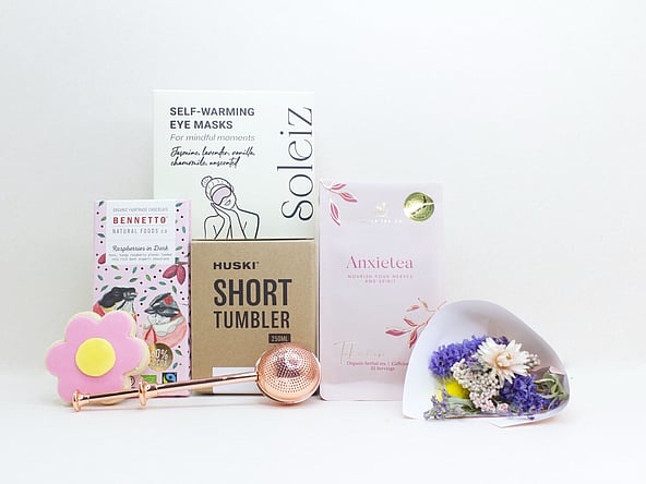 nz sympathy gifts with dried flowers, chocolate and eye masks