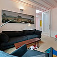 Old Mill House lounge are with dark blue couch
