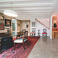 Old Mill house dining area with view of stairs and kitchen