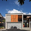 Architecturally designed street view of the house