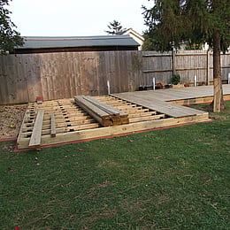 Still more decking boards to attach to the joist frame.