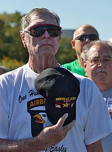 Veteran with hat over his heart, captured at the 2024 Arch Re-dedication Ceremony