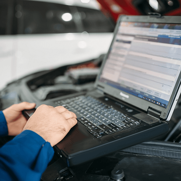Technician on a laptop providing support