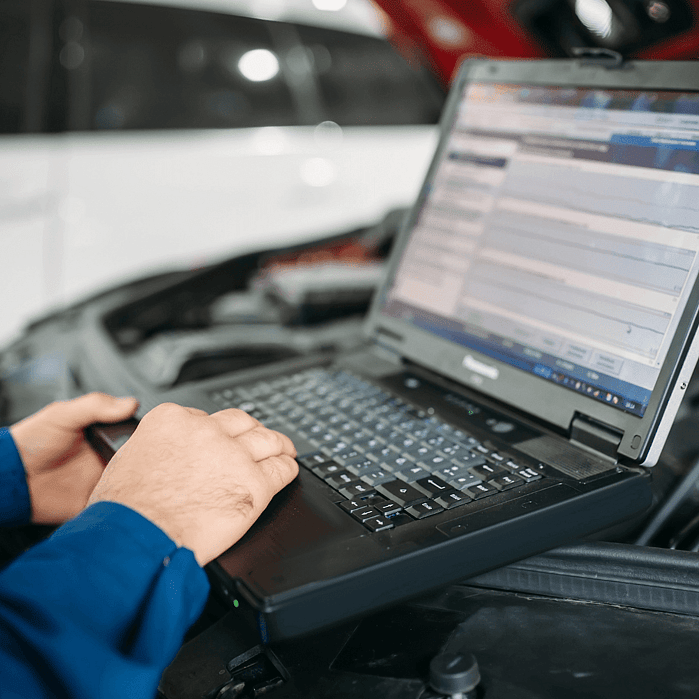Technician on a laptop providing support