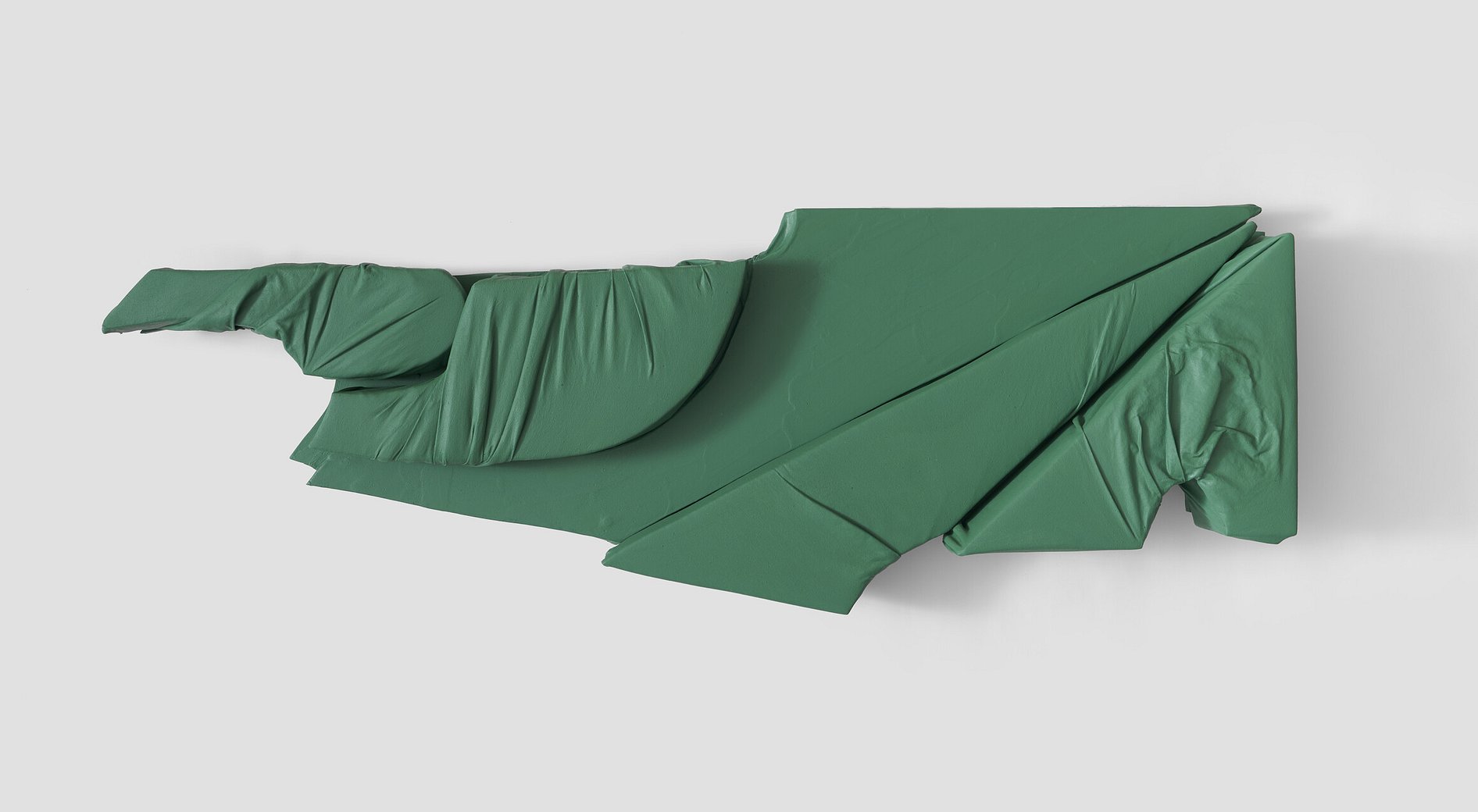Green abstract wall sculpture large format shapes  folds and curves, lines and levels