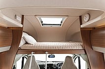 large king bed, over cab with curtains