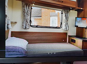 single bed 5'0'' by 2'6'' with own tv,dvd