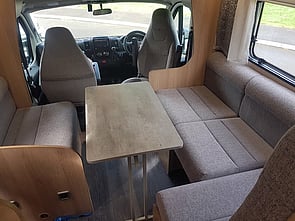 Large 6x seater lounge, with 2x captains chairs for your comfort