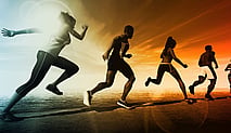 Group of 4 people running in a line