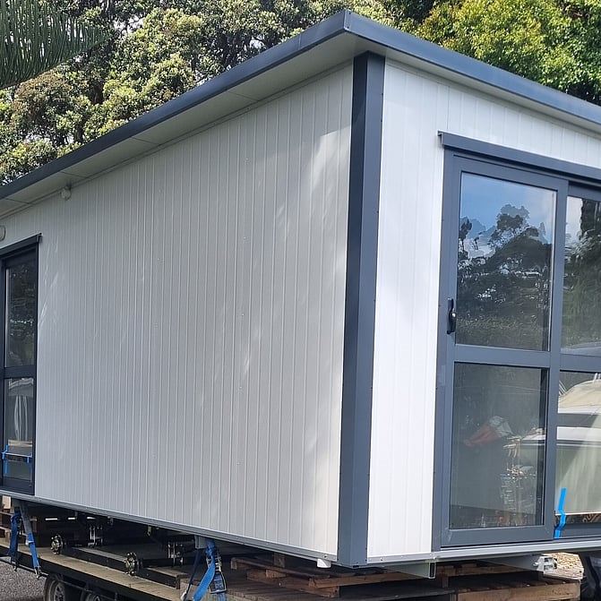 4.6m x 2.7m Grey with laminate floor