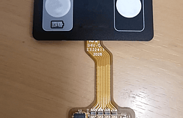FPC flexible circuit with SMT component assembly on keypad tail.