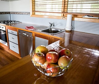 country style modern kitchen with timber benchtops