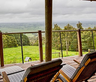 deck with chairs and showing the big view below