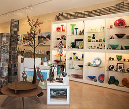 Inside Town and Country Gallery showing beautiful glassware