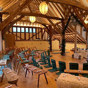 The Barn can host up to 90 people, seated on a selection of chairs, benches and backjacks according to your needs