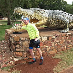 The cyclist near famous croc sculpture at Normanton