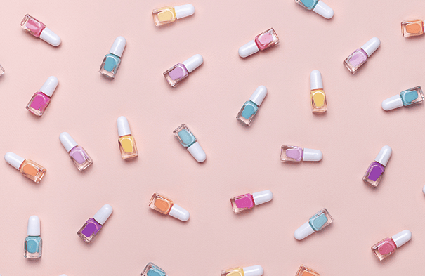 Image of coloured nail polish bottles at the nail salon