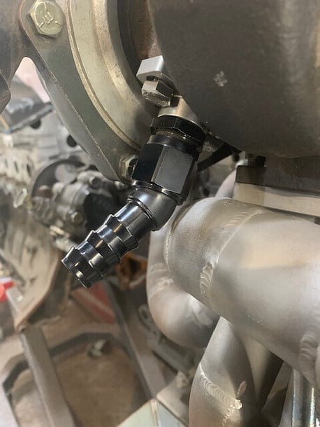 To clear the wastegate port with the threaded fittings the angle of the turbo oil gallery is to great