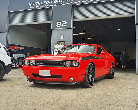 Hamilton custom car upgrades and modifications with red performance vehicle