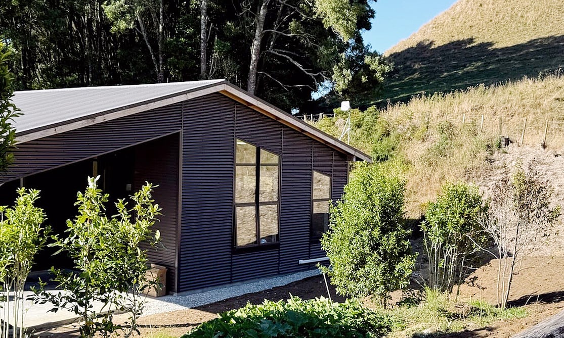 Image of office space with dark exterior cladding. Renovated by Otorohanga builders, Coull Builders.