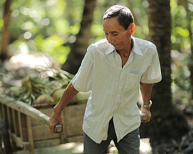 man pulling cart
