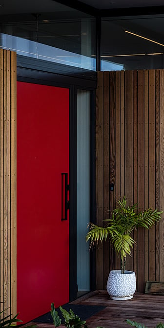 Red door of Hamilton Lake house