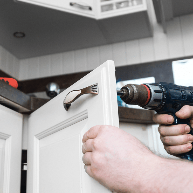 Property repairs and maintenance to kitchen cabinets in a Rotorua home