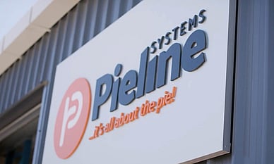 Building signage at Pieline Systems - commercial pie maker equipment