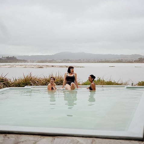 Small group soak in mineral waters popular for soothing tired muscles and joints