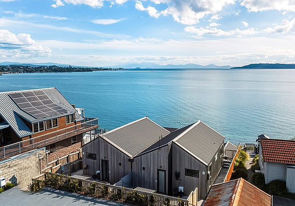 Aerial view of Roam Taupo lakefront and upper terrace units overlooking Lake Taupo