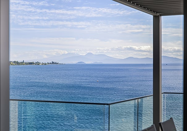 Lake and mountain views from the balcony of a Roam Taupo upper terrace unit