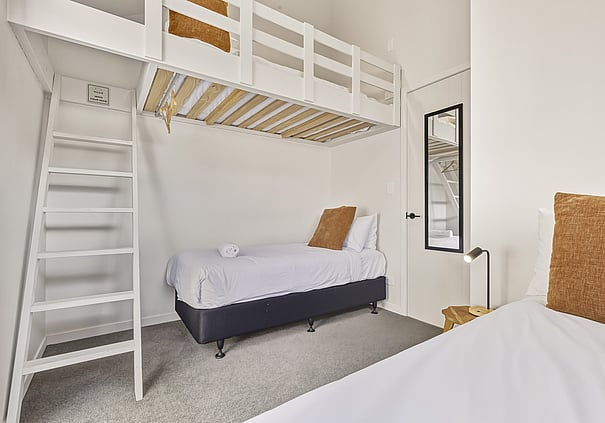 Loft bunk bedroom inside a Roam Taupo unit