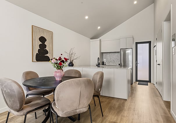 Dining and kitchen area inside a Roam Taupo unit