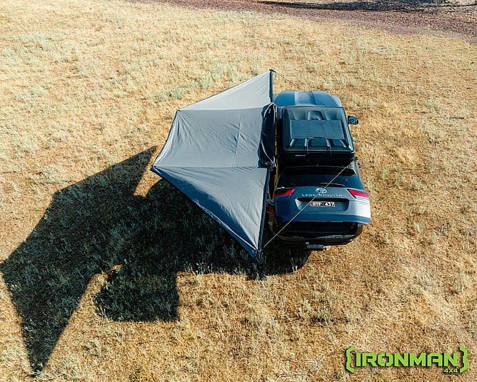 Ironman 4x4 Deltawing 180° 2.1m Awning - Built for Comfort: Blackout Shade & Weather Protection