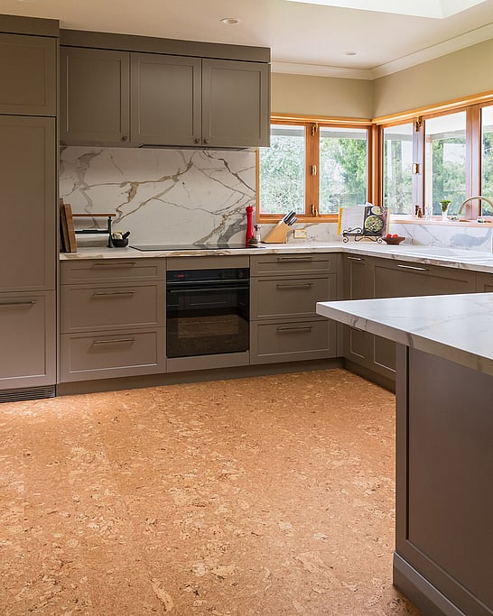 Wood look flooring in cork in a modern kitchen.