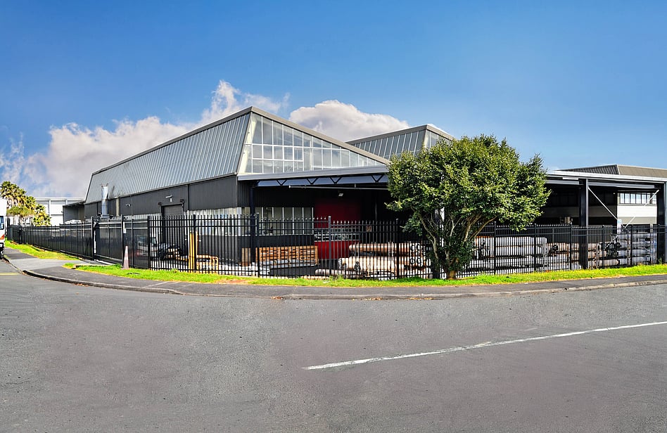 Black aluminimum pool fencing with charcoal composite boundary fence