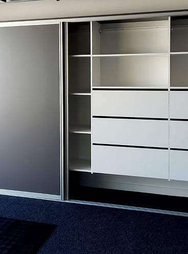 Built-in garage storage with sliding door open
