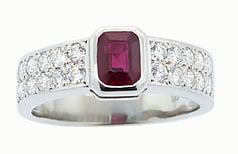 Emerald cut Ruby, round brilliant diamonds, Platinum ring
