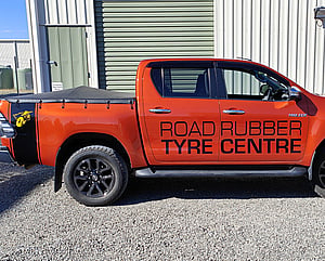 vehicle graphics on right side of Road Rubber Tyre Centre vehicle alternate design