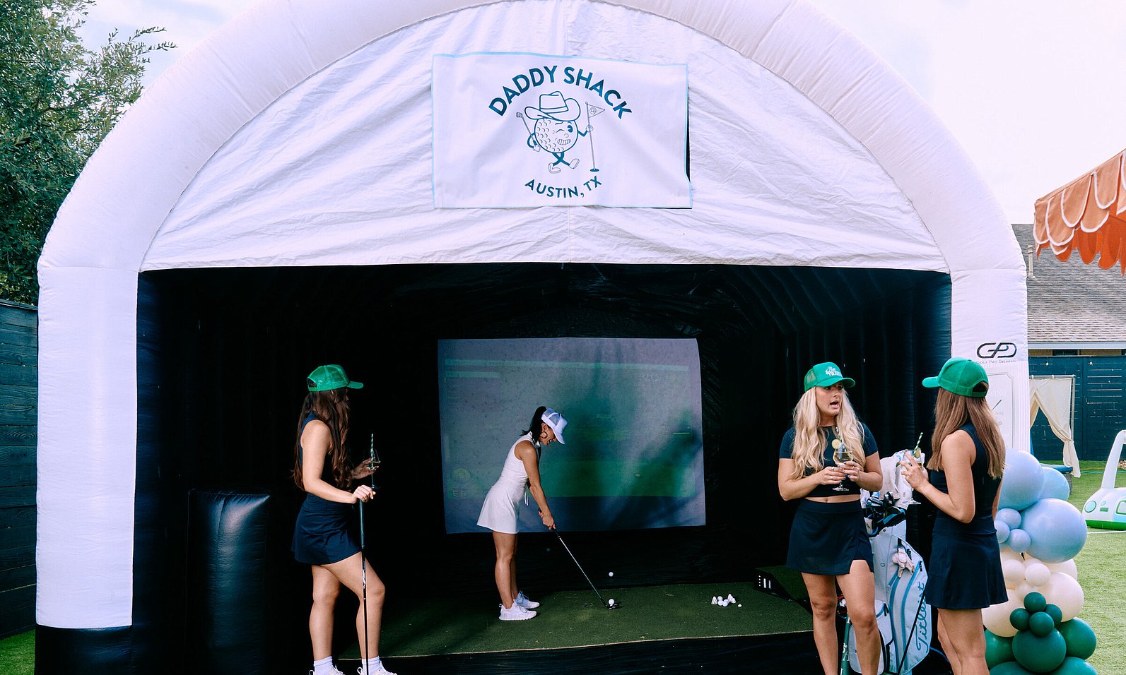Bachelorette party using the Daddy Shack golf simulator