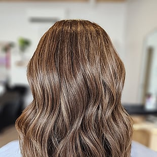 A blended brown balayage hair colour and style by Hair by Shiyee.