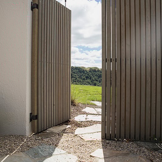 New gate and custom paving at a residential home in Rotorua by Ultrascape Landscaping
