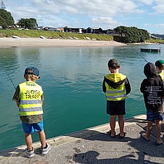 Kids fishing off the wharf
