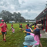 School Holiday programme - image of kids playing outside