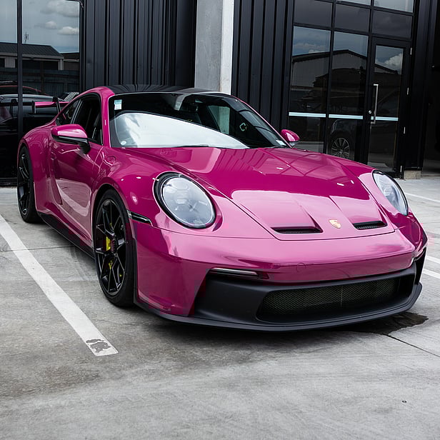 High-gloss finish on a car after professional ceramic coating application.